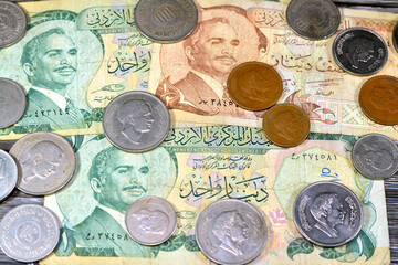Jordanian money background of old coins and banknotes of Dinars of old times, old vintage retro...