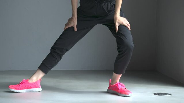 Animation of flexion of the lower body of a woman in sportswear doing sports and other exercises Preparation and stretching