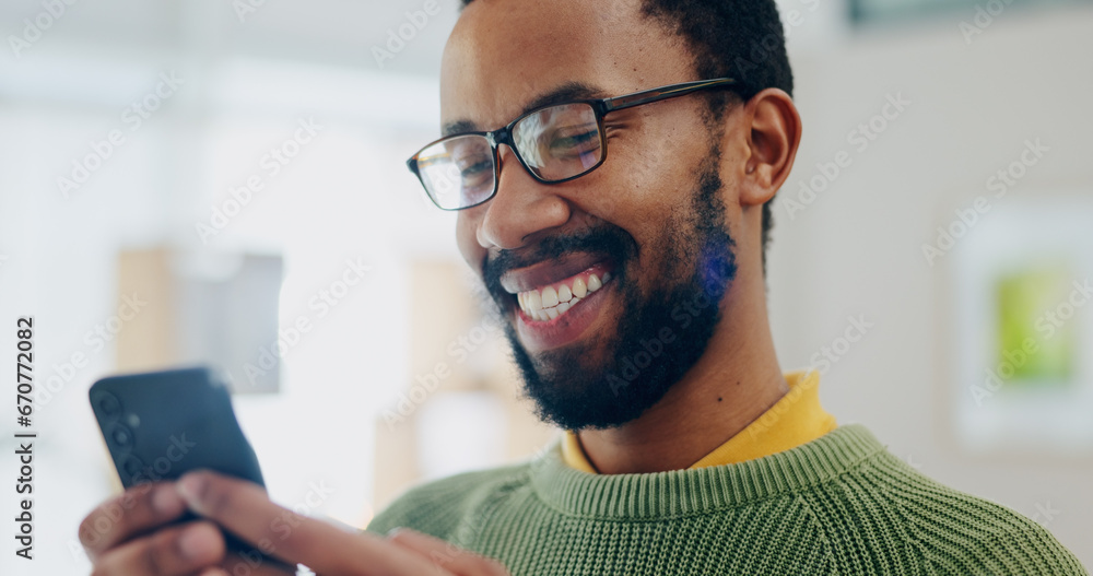 Poster happy, black man and phone with text and smile from social media scroll and internet in a home. mobi