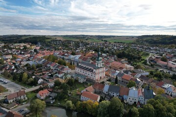 Fototapeta na wymiar Polna historical city center of Bohemian town with square,column and cathedral and Polna castle,aerial panorama landscape view,Czech republic,Europe