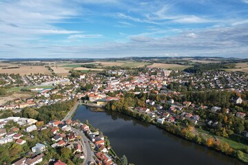 Fototapeta premium Polna historical city center of Bohemian town with square,column and cathedral and Polna castle,aerial panorama landscape view,Czech republic,Europe