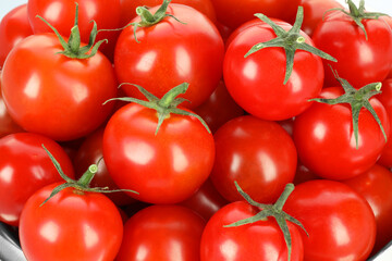 Many fresh ripe cherry tomatoes, closeup view