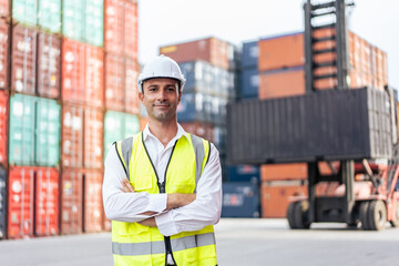 Portrait of Caucasian man worker working in container port terminal. 