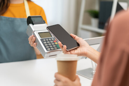 Pay, Cashless Technology Concept, Customer Using Smart Mobile Phone For Payment, Paying Money To Transfer Cashless At Cafe Shop To Buy Breakfast, Holding Wireless Bank Machine At Counter Cashier.