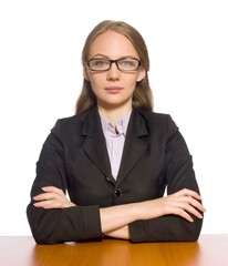 Female employee sitting at long table isolated on white