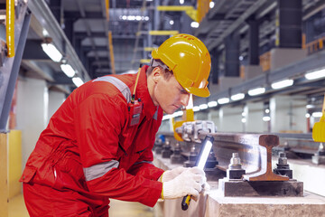 Electric train technician engineer checking controls system for security functions in maintenance...