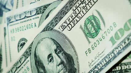 Hundred USD cash dollar banknotes rotating. One hundred dollar. Vertical video - Powered by Adobe