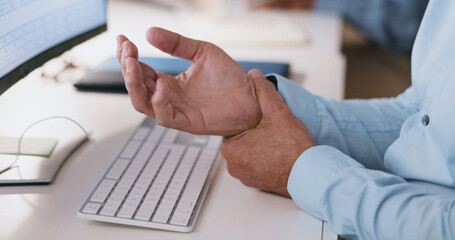 Businessman, hands and wrist in joint pain from injury, overworked or carpal tunnel syndrome at office. Closeup of man or employee with arthritis, ache or inflammation of palm on desk at workplace - obrazy, fototapety, plakaty