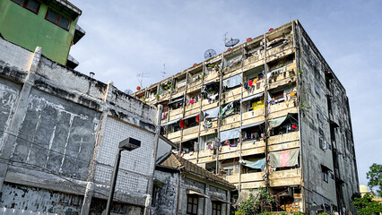 View of poorly maintained apartment Old Building At Chinatown Bangkok Thailand
