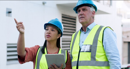 Construction, team and tablet for inspection with people at job site, mentor and apprentice with...