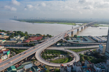 Aerial view of road interchange or highway intersection in Vinh Tuy bridge, Hanoi, Vietnam