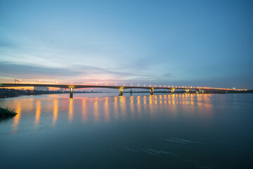 Fototapeta premium Vinh Tuy bridge crossing Red river in Hanoi during twilight