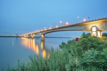 Vinh Tuy bridge crossing Red river in Hanoi during twilight