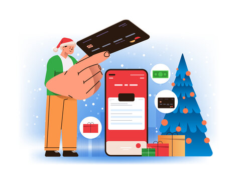 man in santa claus hat holding credit card for shopping online guy adding payment details information in mobile app on smartphone screen
