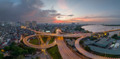 Aerial view of road interchange or highway intersection in Vinh Tuy bridge, Hanoi, Vietnam