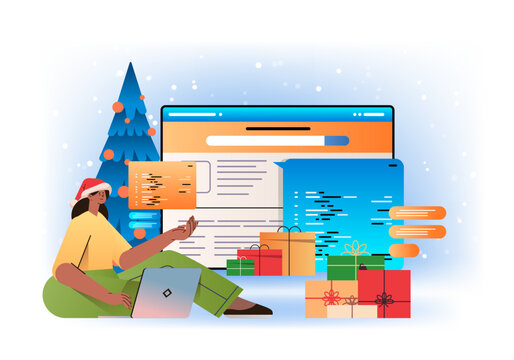 web developer woman in santa hat creating program code on laptop screen development of software and programming concept