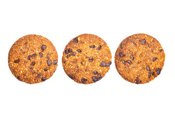 Flat lay delicious homemade crunchy oatmeal biscuits with chocolate chips.