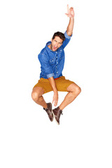 Shout, jump and young man in a casual, trendy and stylish outfit with winning success and energy....