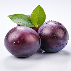 A ripe plum on a white background