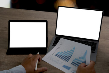 Fototapeta na wymiar Businessman using a desktop compute mock up Using laptop with blank screen computer modern