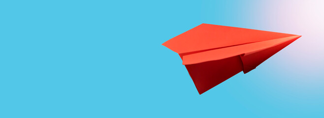 The first to take off was a red paper airplane with a blue background.