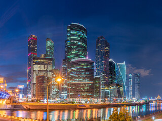 Fototapeta na wymiar Moscow city at summer night. Modern skyscrapers in Moscow-city downtown. Moscow, Russia