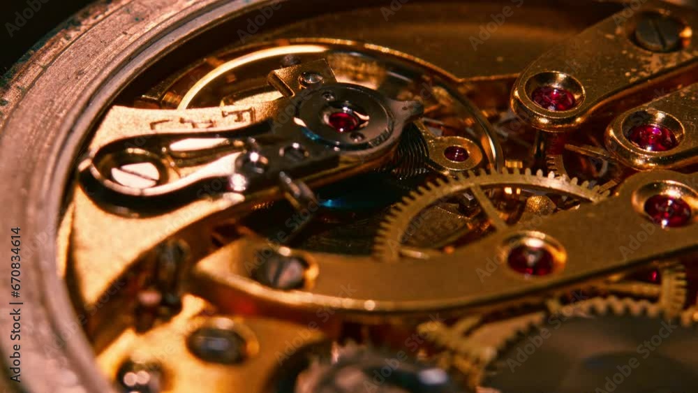 Poster mechanism and gears of an old pocket watch. macro close up shot. static super slow motion.