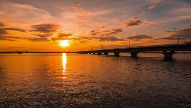 4K Time Lapse beautiful sunset scenery The stunning light of nature at Thepsuda Bridge The longest river bridge and is popular tourist attraction in Kalasin Thailand.