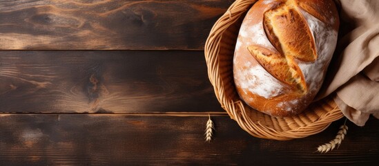 Artisanal bread placed in a basket on a table captured from a bird s eye perspective