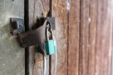 Vintage of key lock door, steel plate locking the door was pried off.