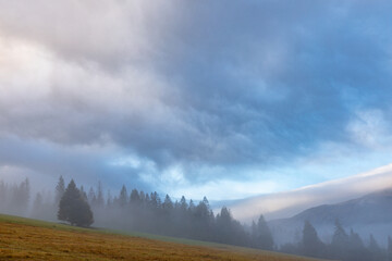 Beautiful dramatic clouds over mountains. Carpathian mountains. Ukraine.