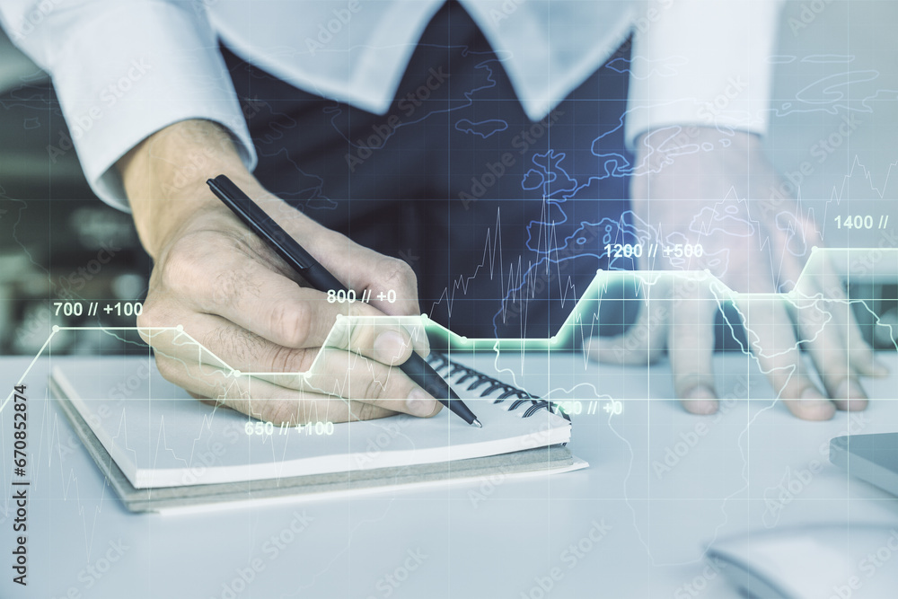 Poster abstract creative stats data concept with hand writing in notebook on background with laptop. multie