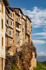 Fototapeta na wymiar Houses perched on the cliff atop the hill of the medieval village of Frias, Spain.