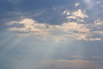 beautiful blue sky and cloud with golden ray sunrise in the morning, natural background