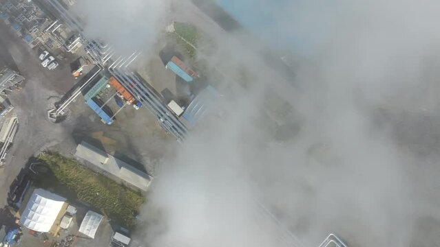 Overhead view of a geothermal power plant with artificial wells