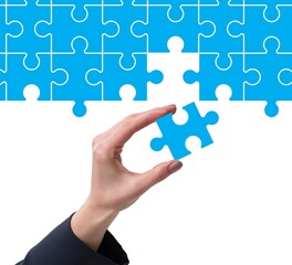 Concept of businessman with missing jigsaw puzzle piece