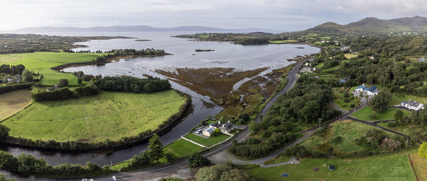 typical house and road next to Bantry Bay, Beara Peninsula, Adrigole, Beara Peninsula, County Cork, Ireland, United Kingdom