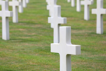 Colleville-sur-Mer, FRA, France - August 21, 2022: American Military Cemetery and white crosses on...