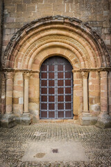 Fototapeta na wymiar Santa Maria de Eunate church , Romanesque façade, 12th century, Ilzarbe Valley, Navarra, Spain