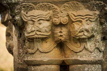 Fototapeta na wymiar Santa Maria de Eunate church , Romanesque figurative capital,, 12th century, Ilzarbe Valley, Navarra, Spain