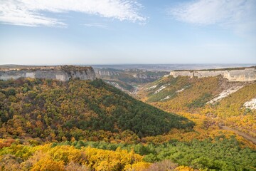 Fototapeta premium The autumn landscape of the mountain valley is an amazing, beautiful place at any time of the year. Hiking. Nature