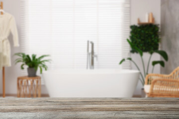 Empty wooden table in bathroom. Space for design