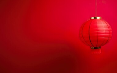 Spring Festival Poster. Minimalistic modern banner template with a hanging lantern. Chinese New Year decorations on bright red background, copy space.
