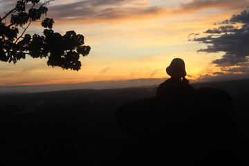 Fototapeta na wymiar a silhouette of a group of people at sunrise in Bromo
