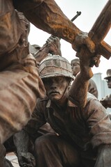 several statues of soldiers on top of a metal platform with their weapon