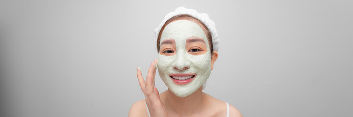 beauty women getting facial mask on web banner