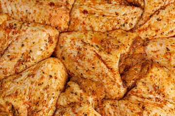 marinated chicken wings close up