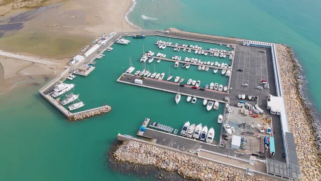 Aerial drone view of the marina in the Spanish coastal town named Comarruga