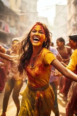Obraz premium Beautiful Indian woman dancing in the street of India, Holi festival, Phagwah, Bhojpuri, multi-colored powder , festival of colors