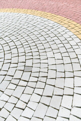 Cobblestone walkway in the park, closeup of photo